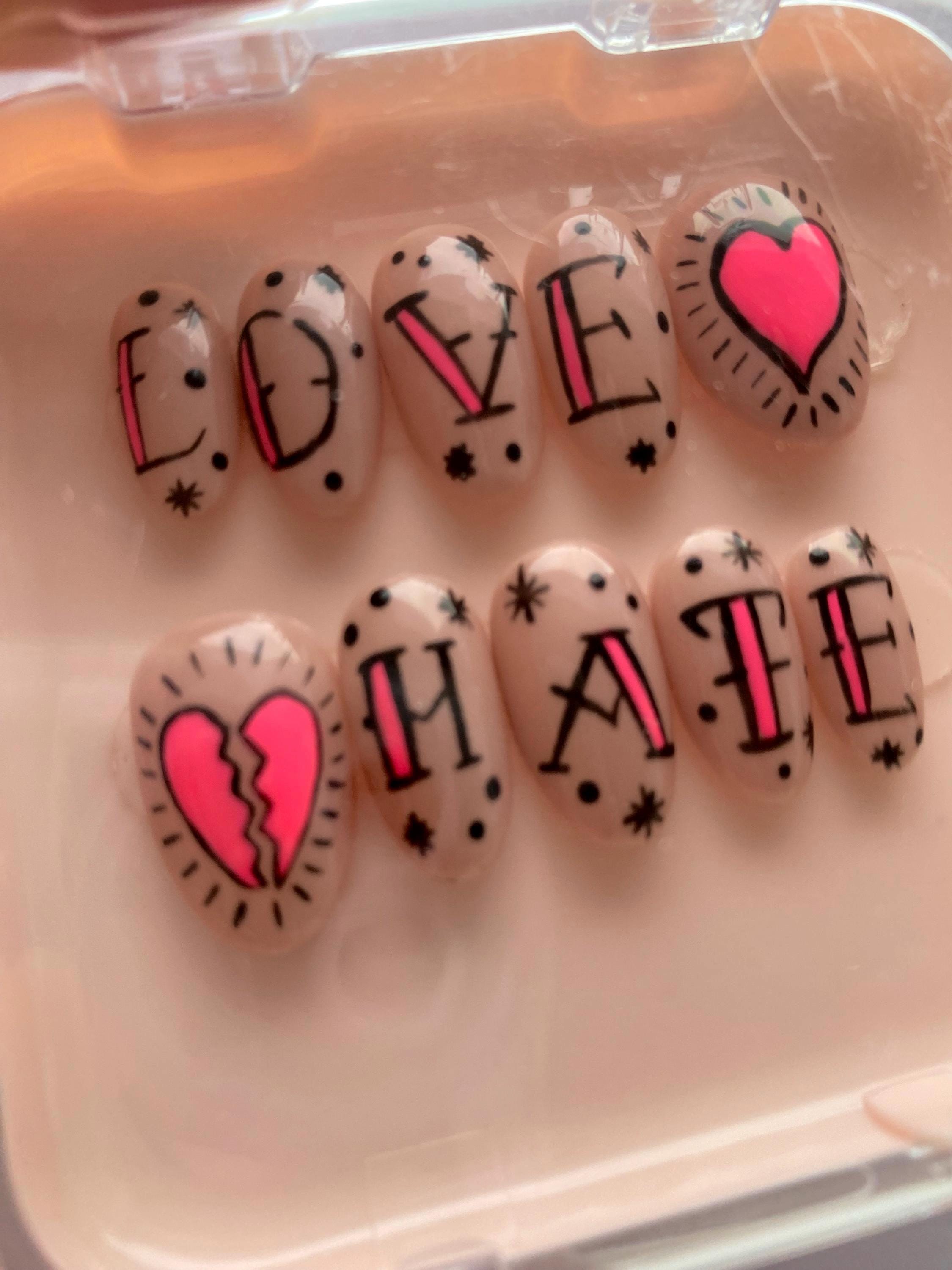 Edgy Valentine's Day Vibes: Tattoo-Inspired Pink Press-On Nails